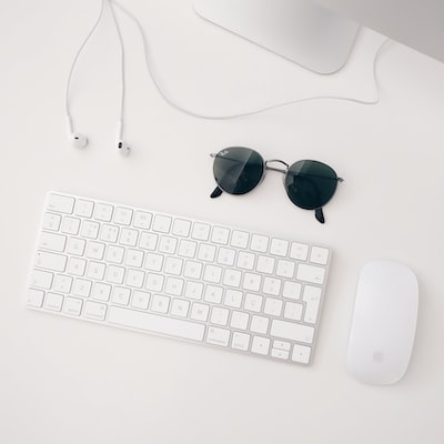 Website to Mobile App Makeover image of sunglasses, a keyboard and ipod headphones